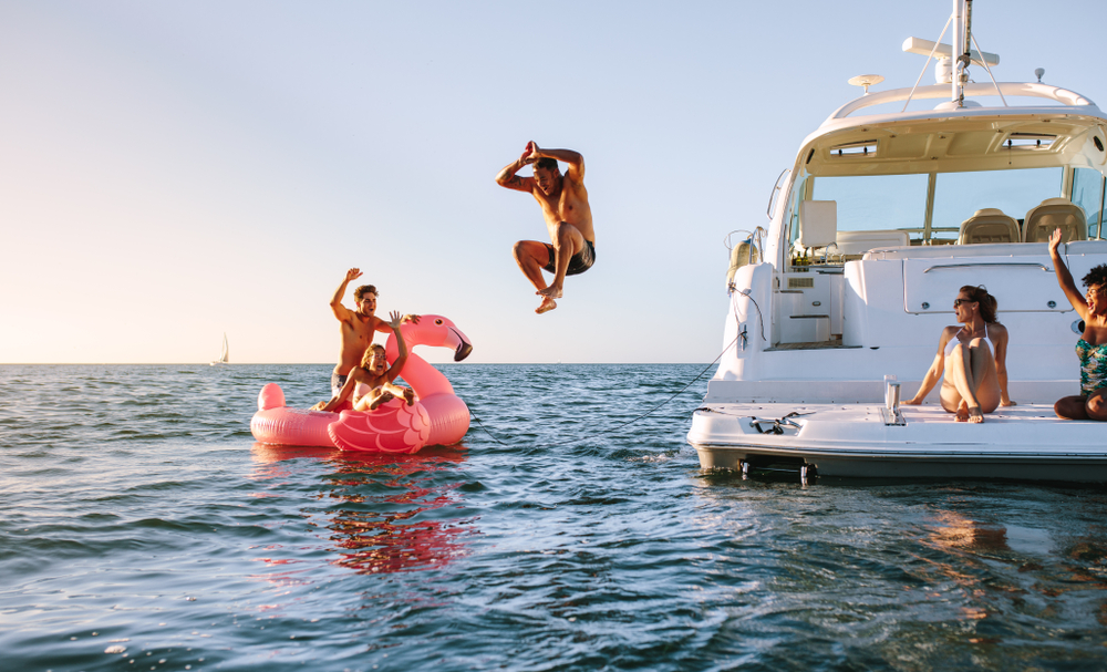 A family enjoying a new boat purchased with a recreational loan from Telco