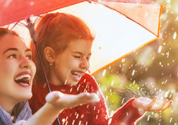 Family under umbrella